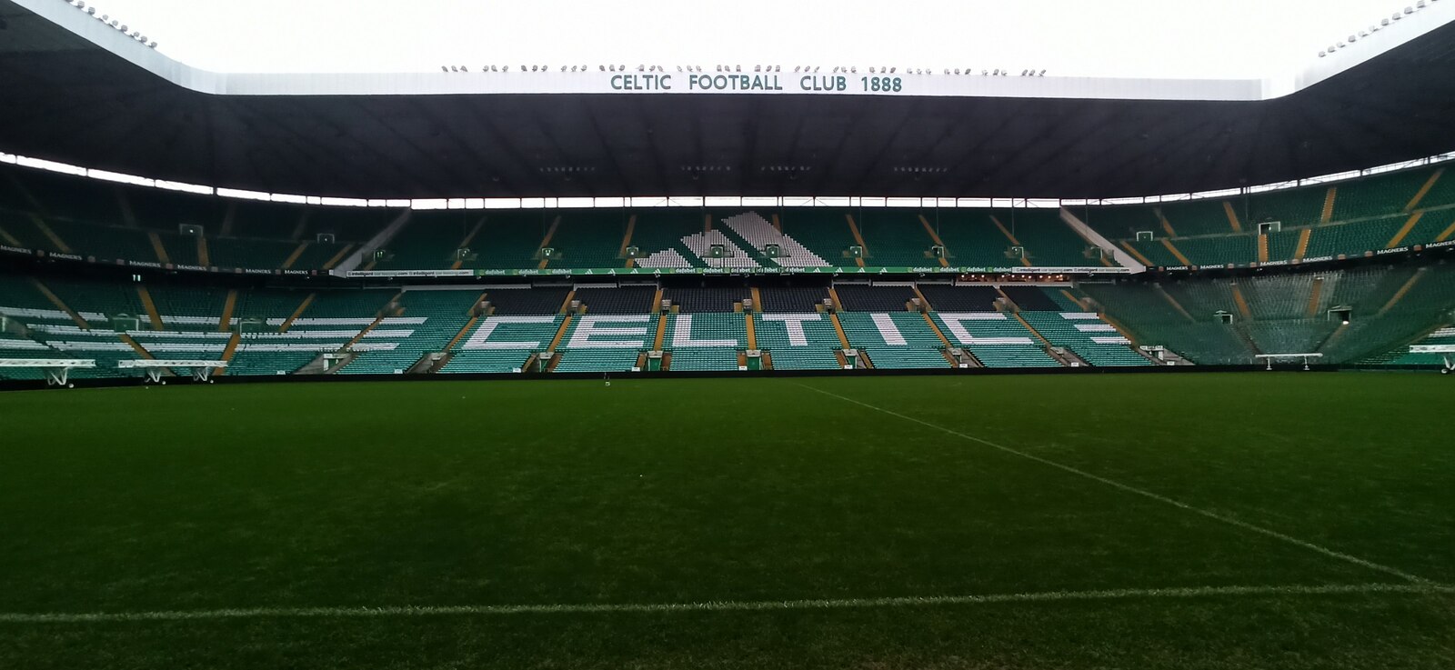 View across the pitch and stands inside Celtic Park in Glasgow
