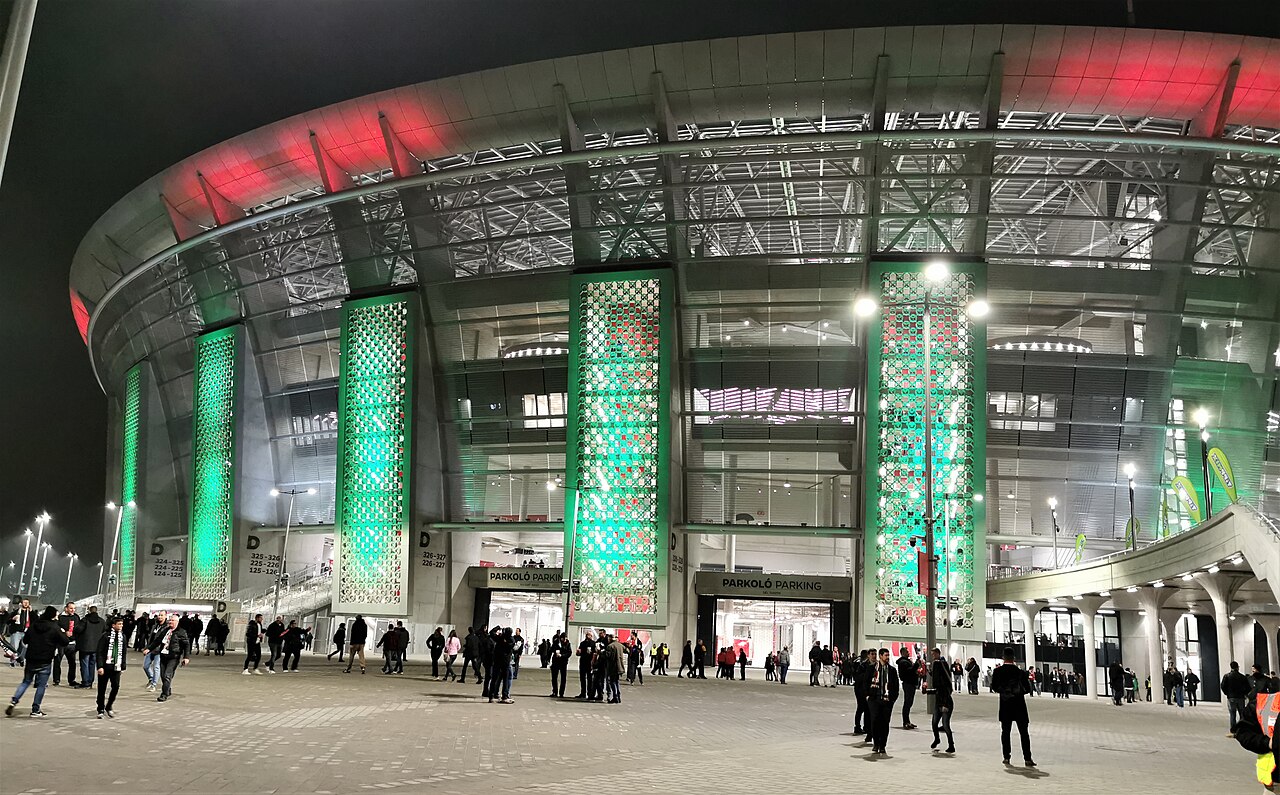 Puskás Aréna illuminated at night in Budapest